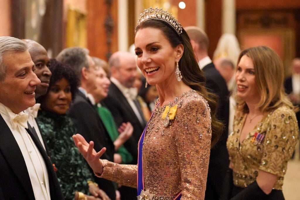 Kate Middleton on December 5 of 2023, wearing gold.