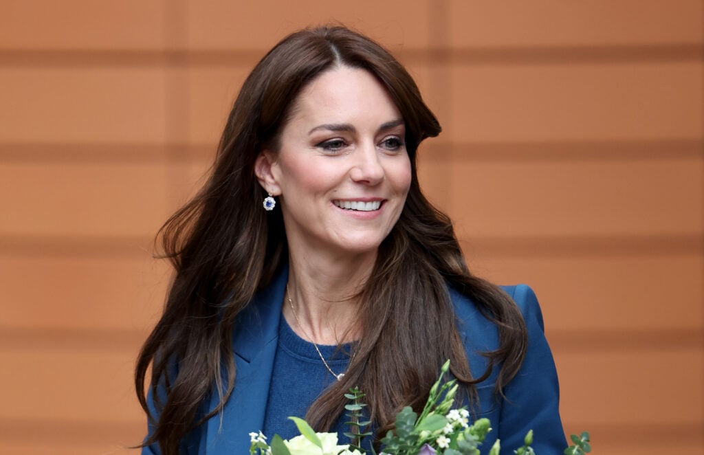 Kate Middleton flashes a smile on December 5, 2023.